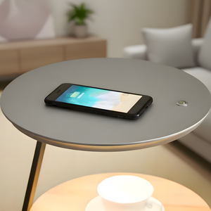 Smartphone on a round gray table in a living room setting