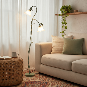 Living room with beige sofa, wicker side table, and floor lamp.