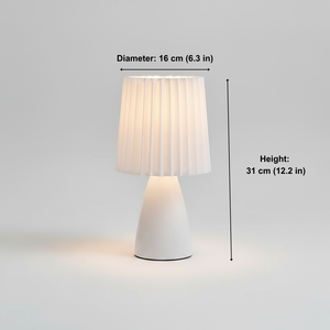 White table lamp with measurements on a light gray background