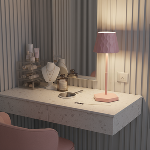 Pink table lamp on a surface with a mirror, minimalistic decoration and a pink chair