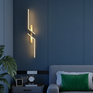 Modern LED wall light beside a bed with nightstand.