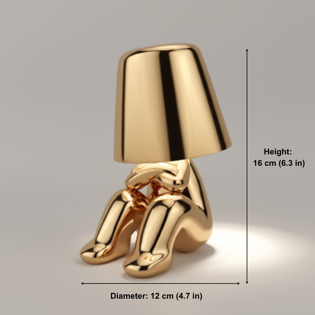 Gold-colored lamp with dimensions indicated on a gray background