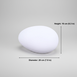 White stone with measurements on a gray background