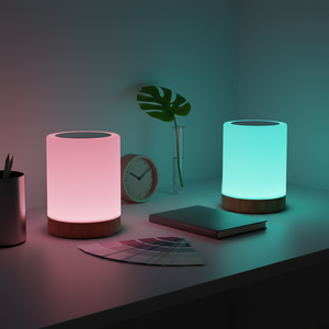 Two colorful nightstands on a desk with a plant, clock, and color swatch.