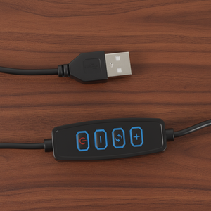 USB cable and electronic device with buttons on a wooden surface