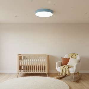 Nursery room with wooden crib, rocking chair, and ceiling light.