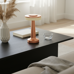 Modern coffee table with decorative items in a living room setting